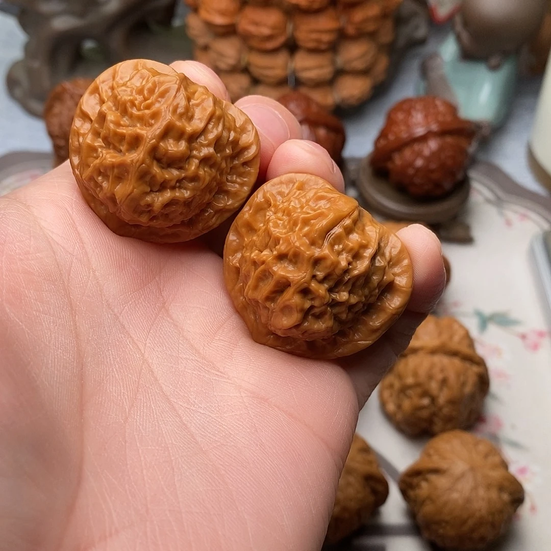 薇***笑把件文玩核桃瓷娃娃