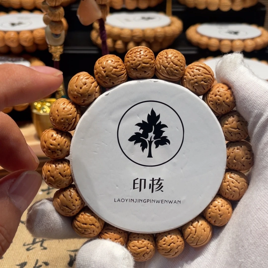 吊坠桃核金丹手串