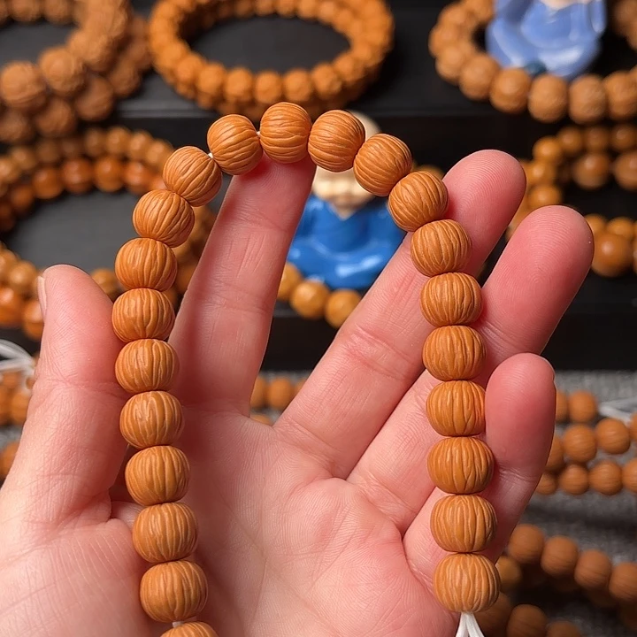 楚***王猴头核桃手串QQ兔小心翼翼我