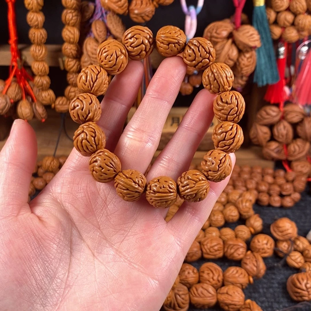 吊坠桃核海**空9链接桃枭手串