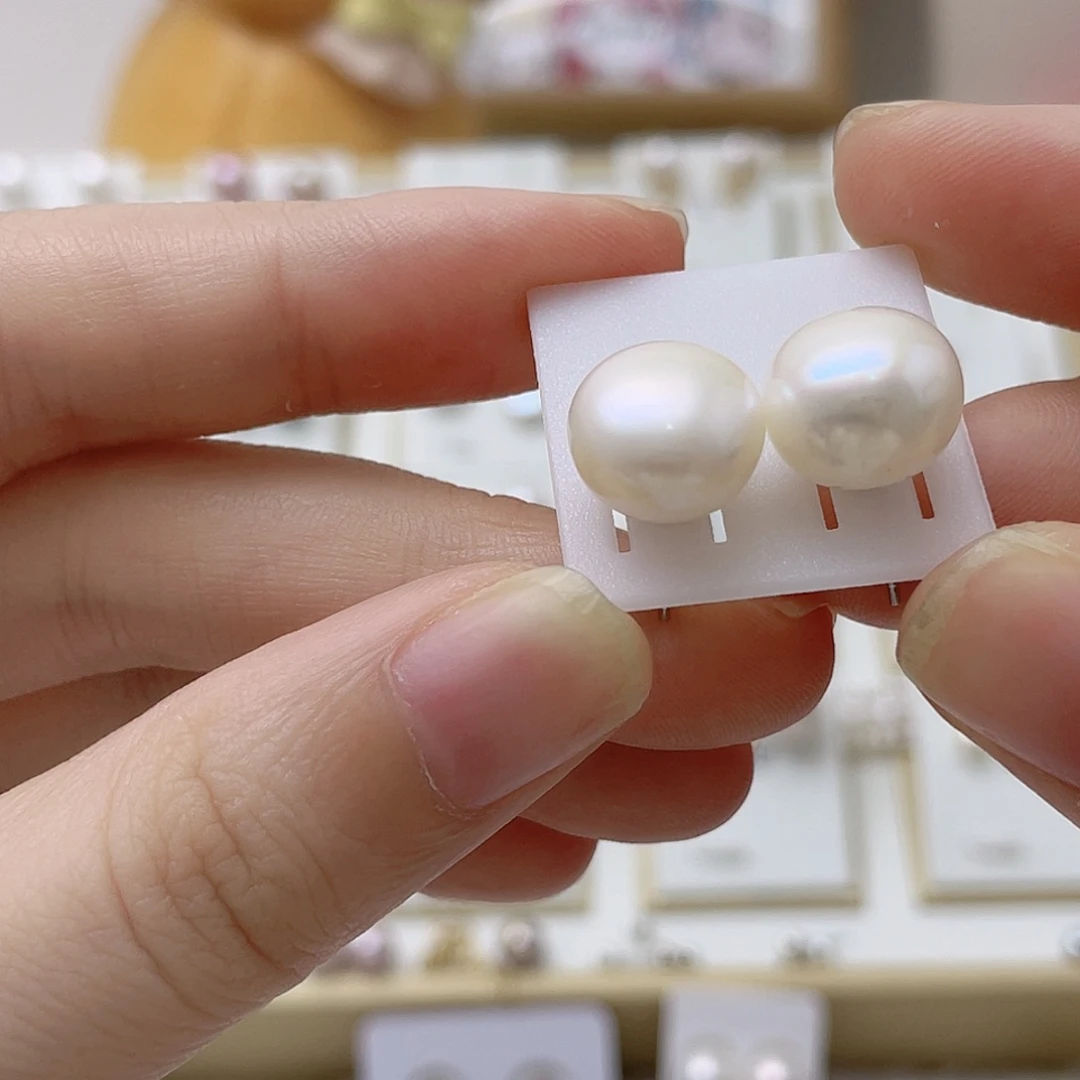 丹***丹淡水珍珠银S925镶嵌耳饰