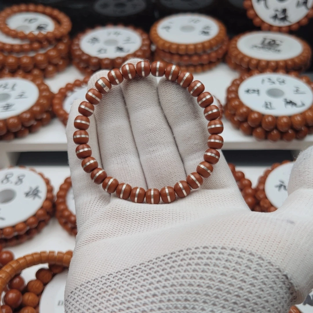 此***生吊坠桃核桃核手串