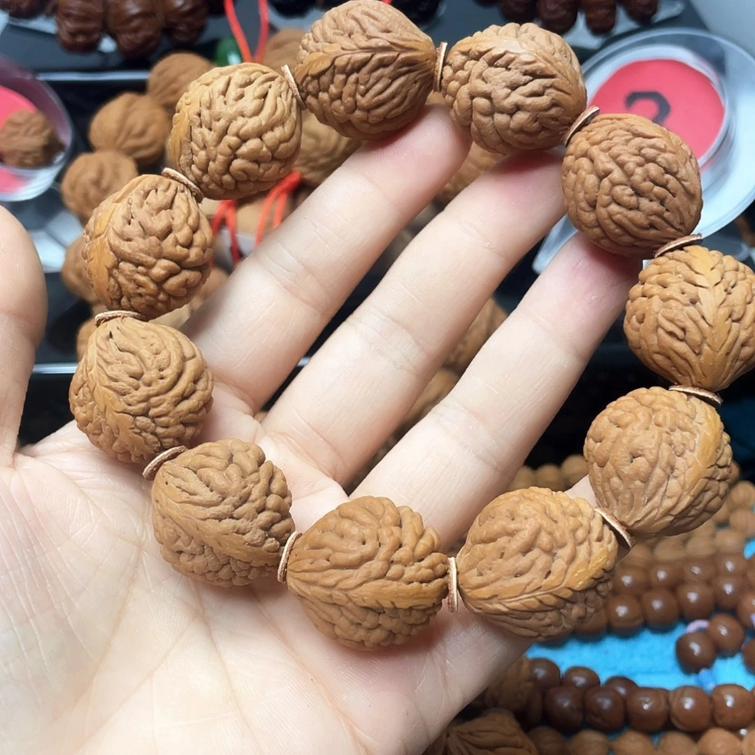 我***酒桃核把件桃枭手串23尺寸11颗