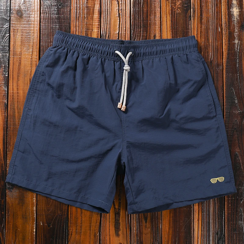 男士沙滩裤  速干轻薄宽松休闲纯色短裤  带内衬游泳健身运动泳裤