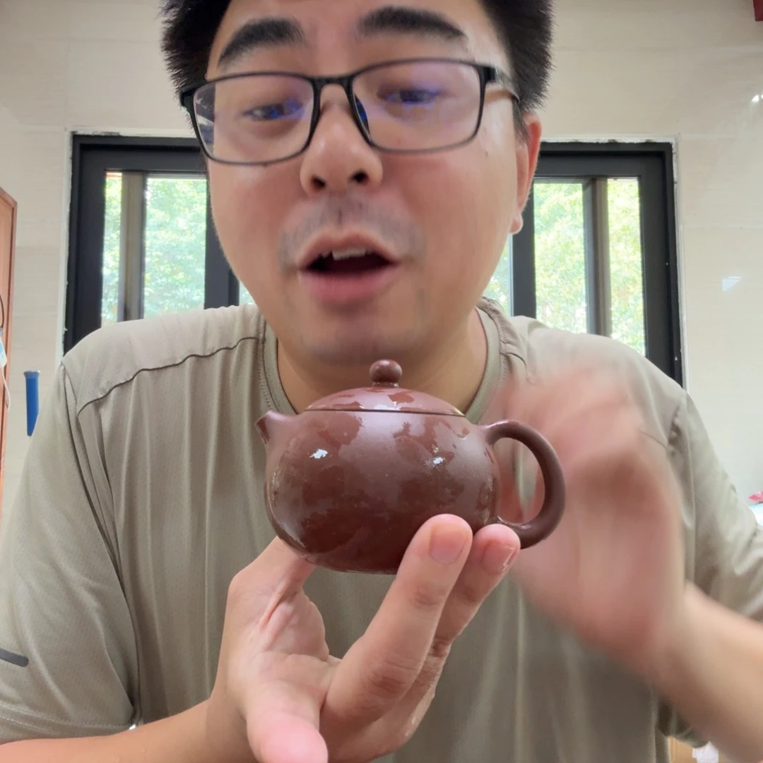 茶杯紫砂微瑕的壶