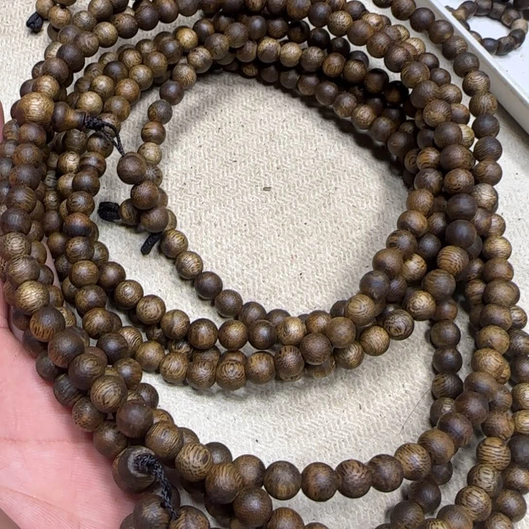 沉香沉香碎屑奇楠沉香圆珠长串0.7/13g凹身多样性发一条