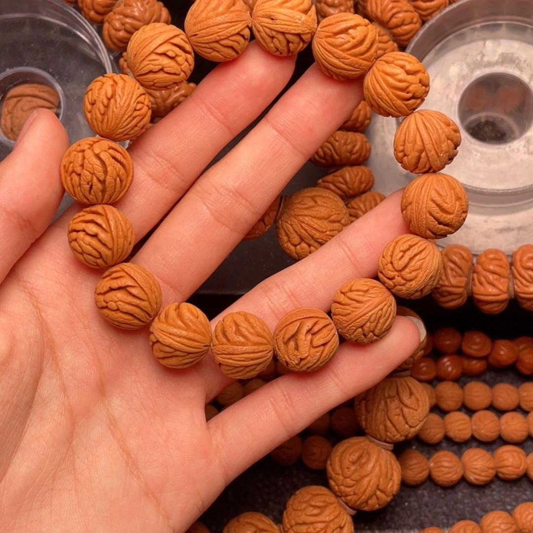 阿***慕吊坠桃核秦岭核桃绣球