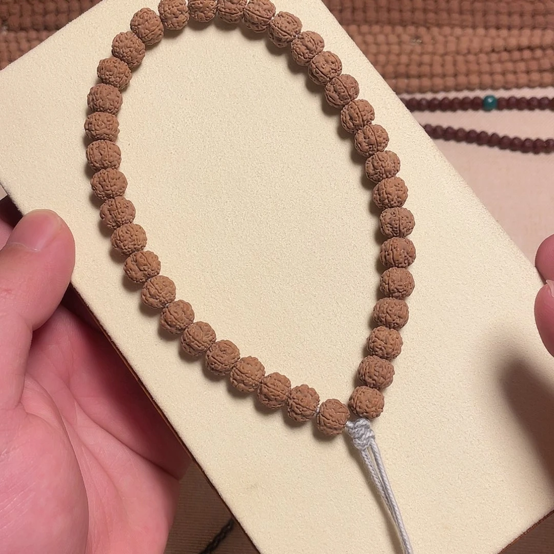 抱***金刚菩提吊坠梅花