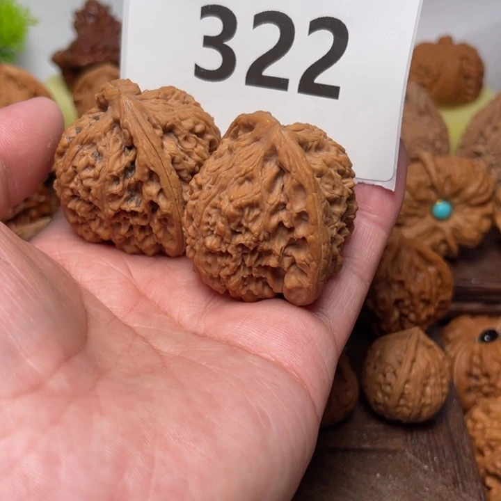 桃核把件全 南疆石。边40 322