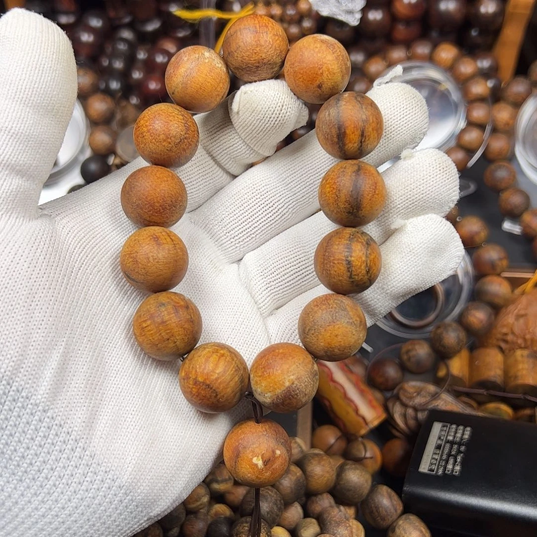 贡木笑****418黄油龙鳞圆珠手串定制