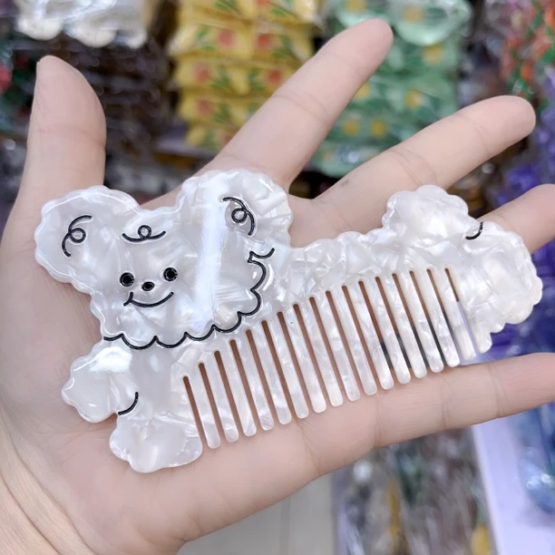 B487小狗子便携式小梳子