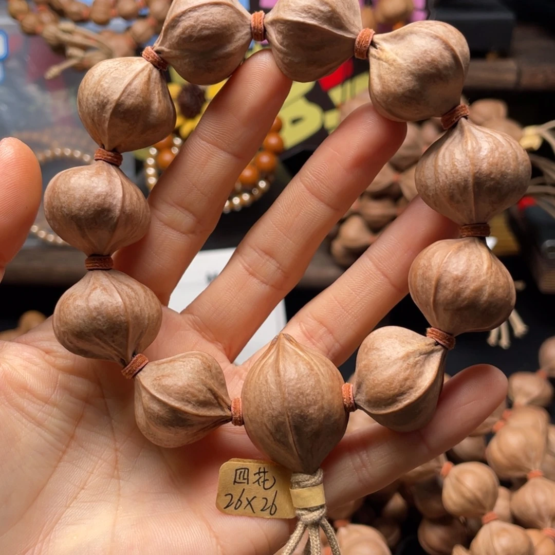 闹***迷吊坠橄榄核2626四花铁核