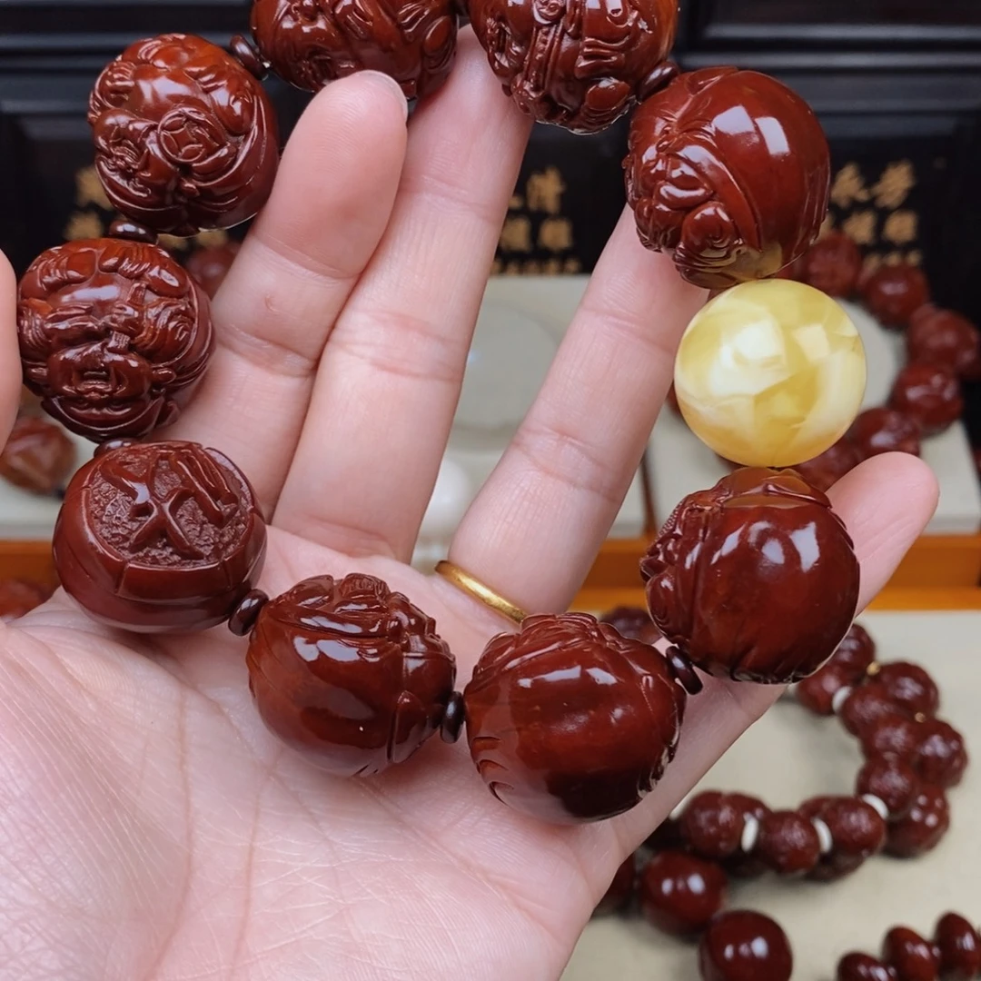 包***生橄榄核吊坠八宝财神