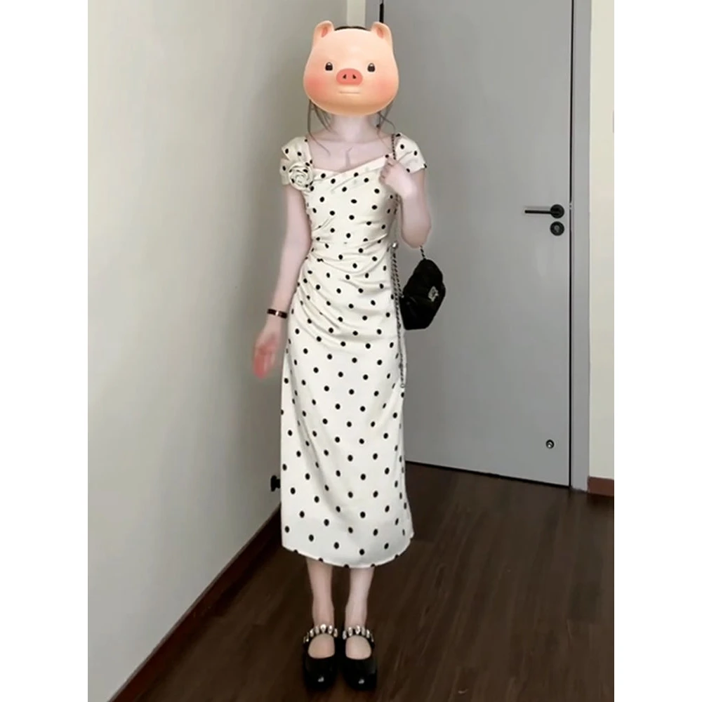 法式气质白色波点连衣裙子女装夏季2025新款立体花朵收腰包臀长裙