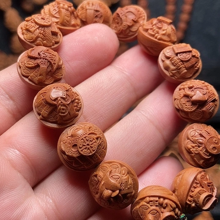 龙纹桃核锦灰堆手串