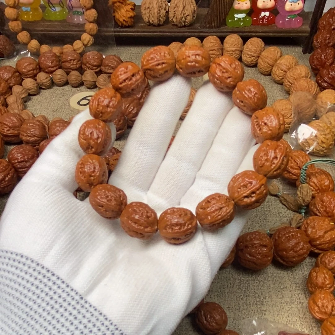 鱼***迟文玩核桃吊坠肉筋八棱文玩核桃