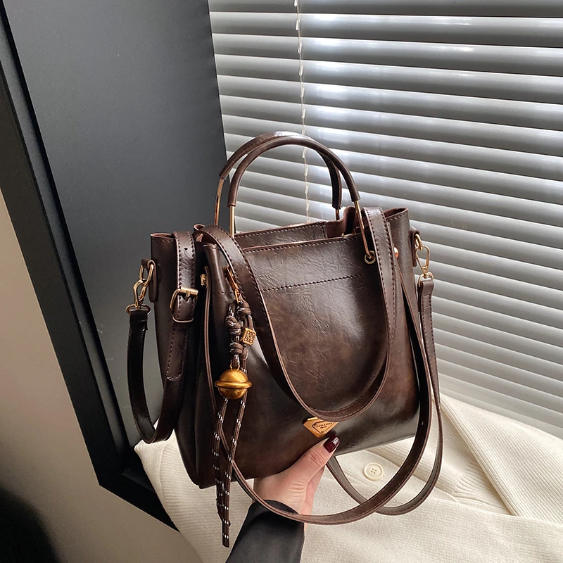 复古手提通勤包包女2025春新款潮时尚托特包简约大容量斜挎包1144