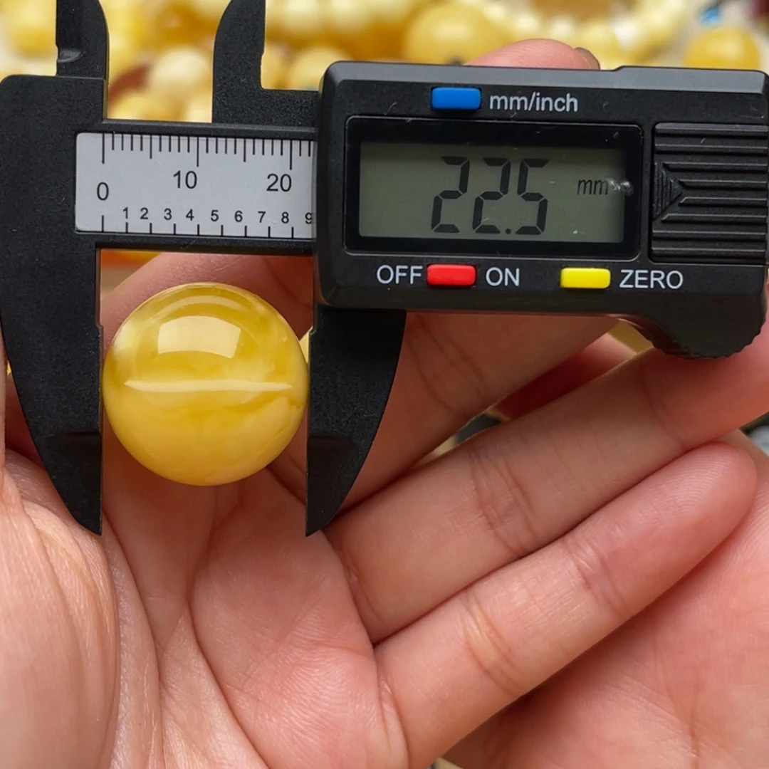 琥珀未镶嵌裸石蜜蜡圆珠笑