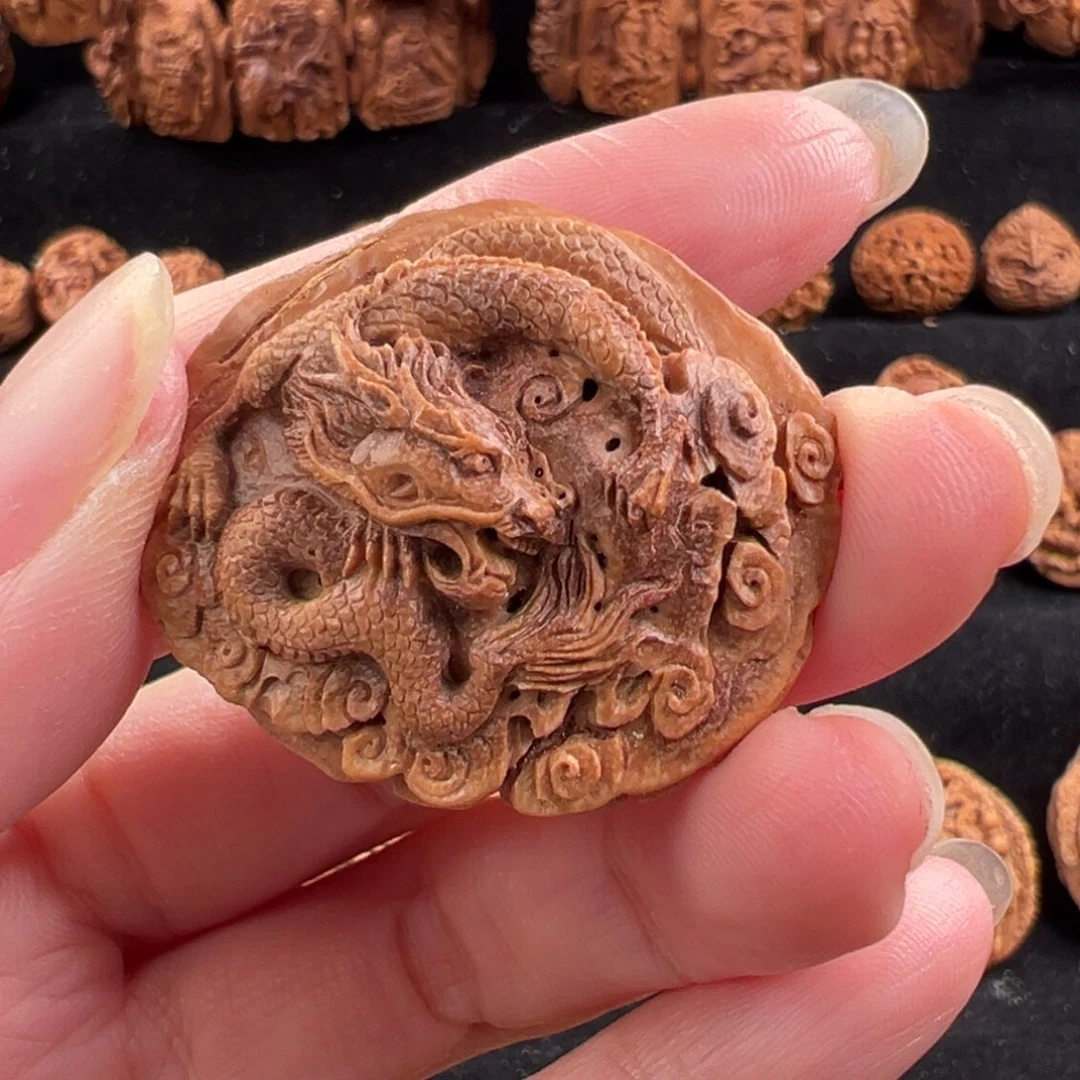 吊坠桃核得**笑桃核雕刻龙单籽