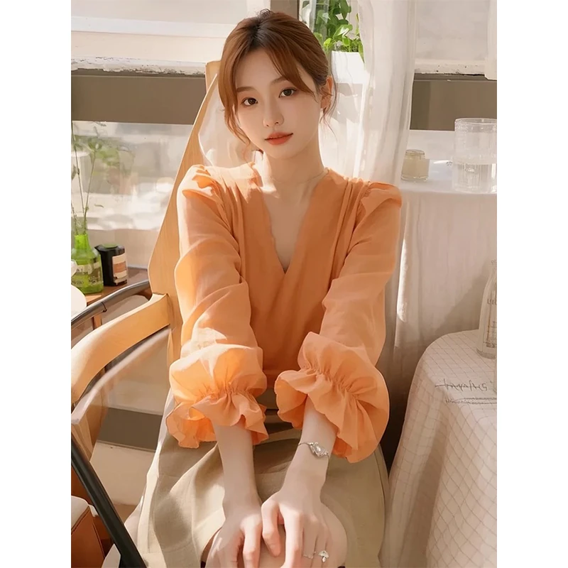 橘色衬衫2025春季新款女独特别致超好看小衫法式仙气飘飘上衣