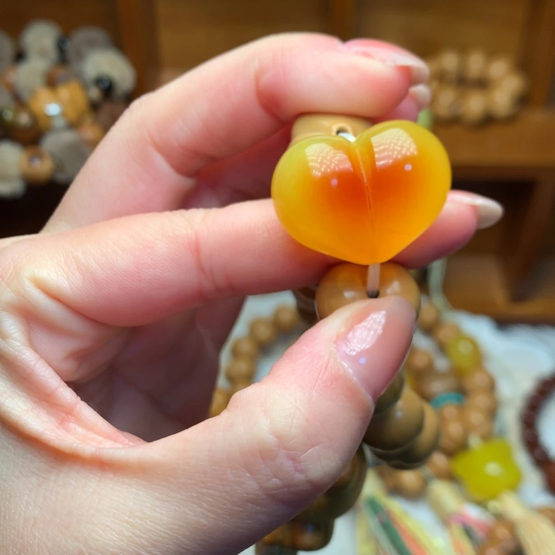 逢***戏猴头核桃吊坠爱心配饰