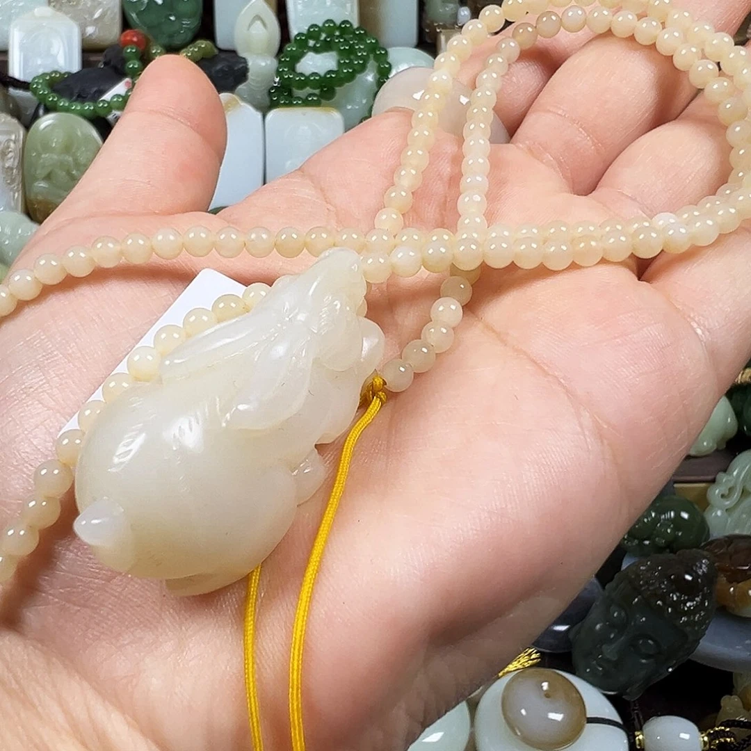 霸***.和田玉未镶嵌颈饰