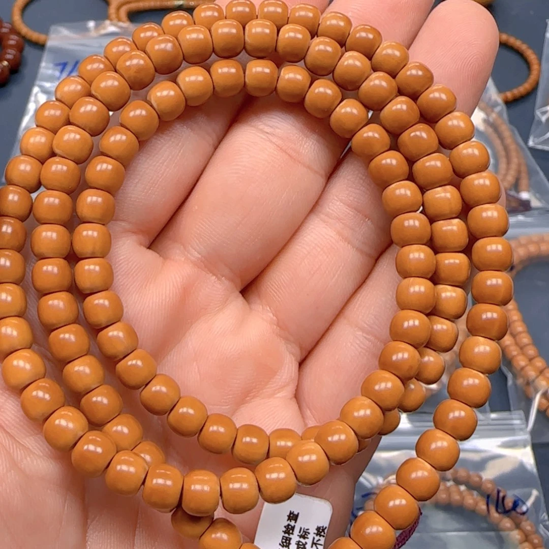 趣****橄榄核手串老挝SS级核尖极限弧尺寸6.5