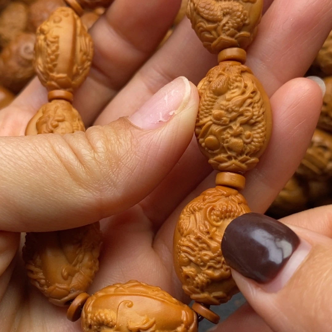 橄榄核手串1.7龙财神