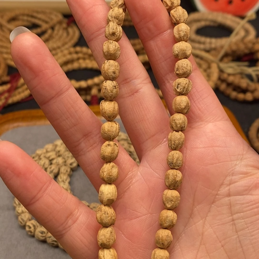 柏香籽/百香籽手串芳**?