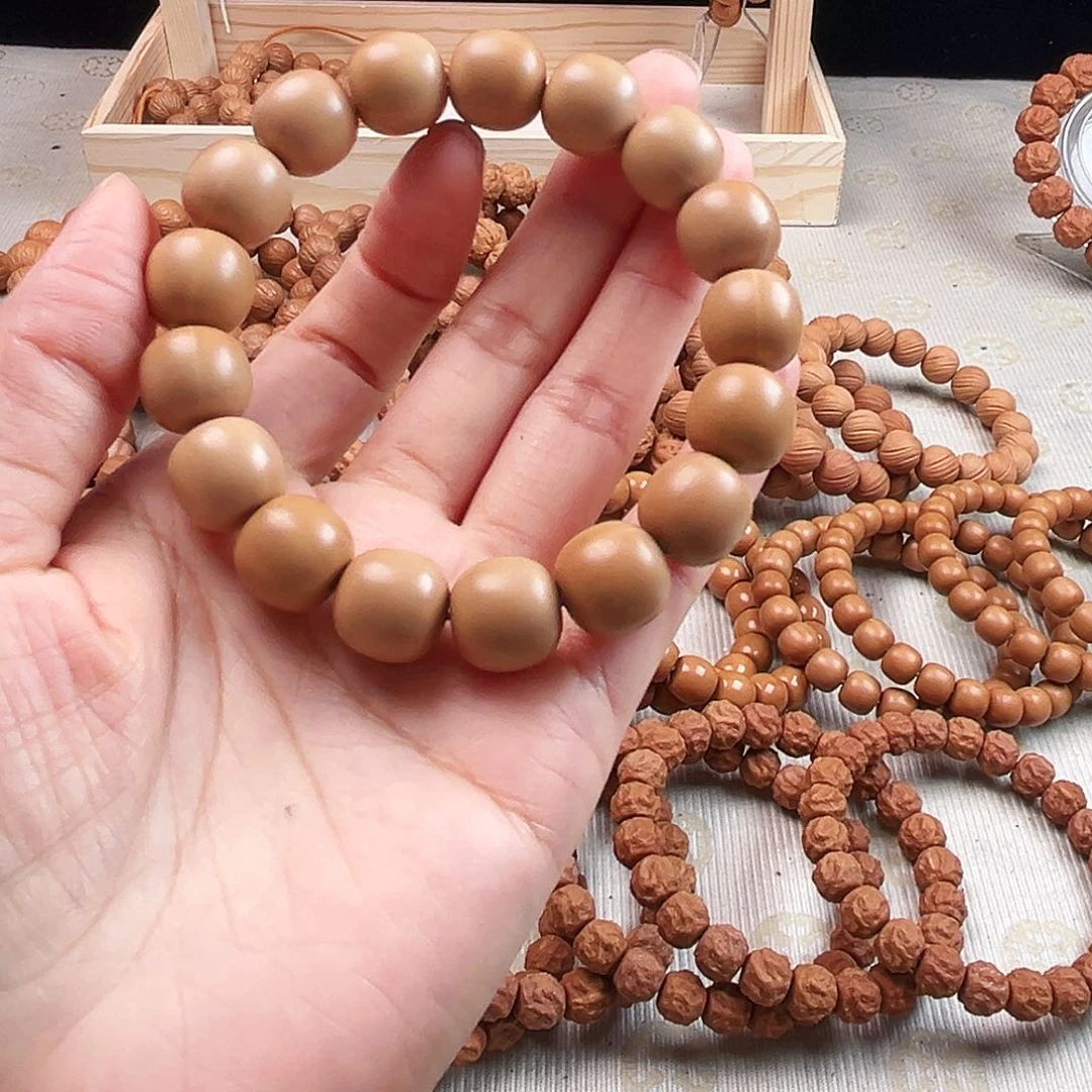 桃核手串瑕疵返油大老型（漏眼）