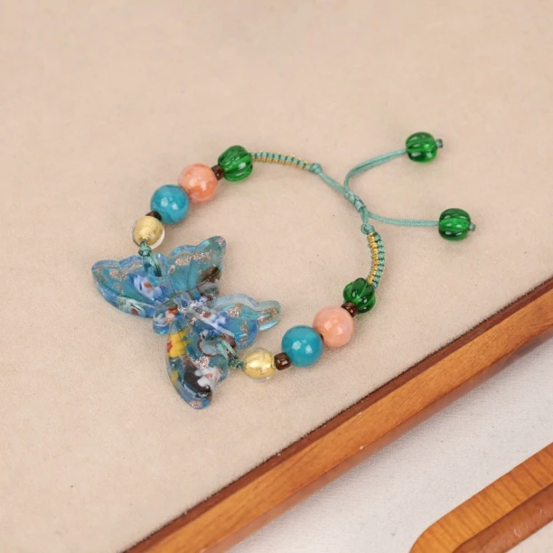 合金手链 玉楼东合金手链  LZ2110 浅蓝色万花蝴蝶绳编琉璃手绳