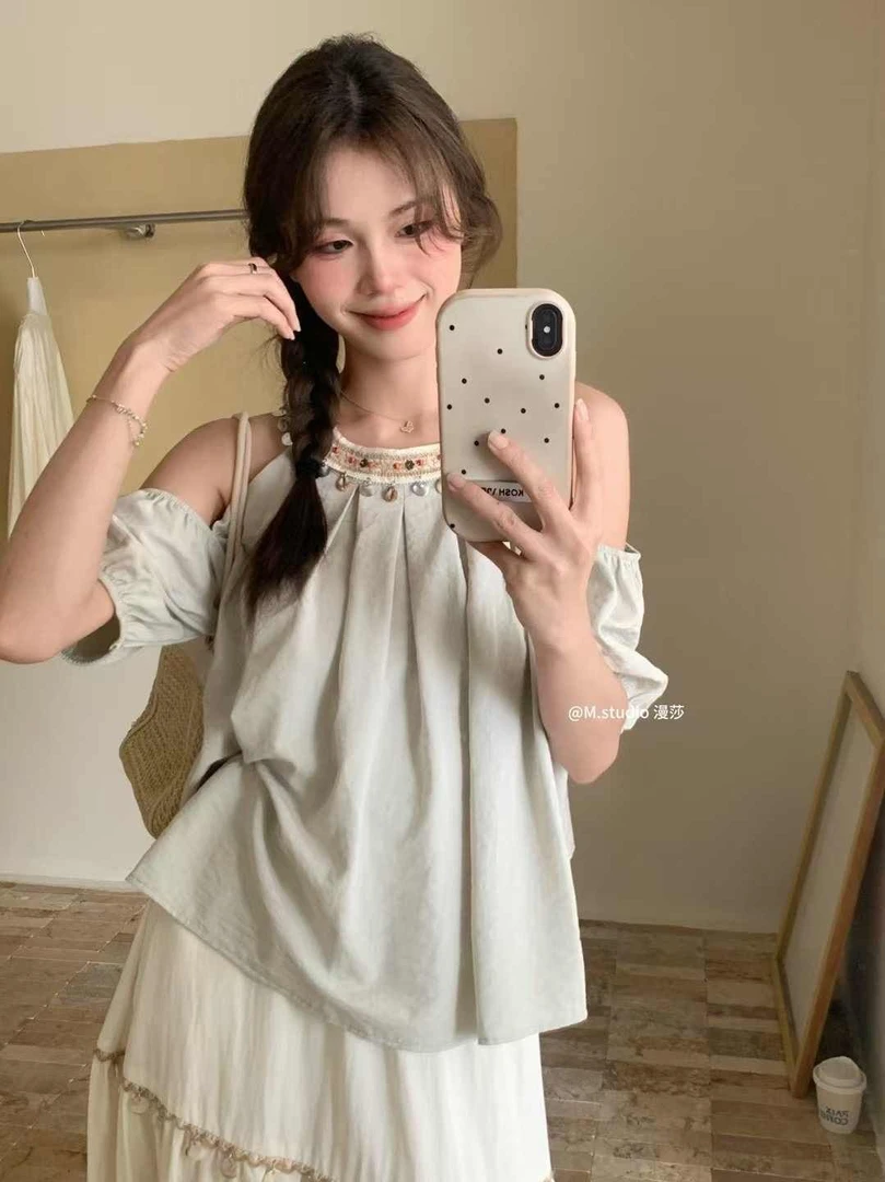 波西米亚镂空挖肩挂脖衬衫贝壳露肩宽松遮肉衬衣