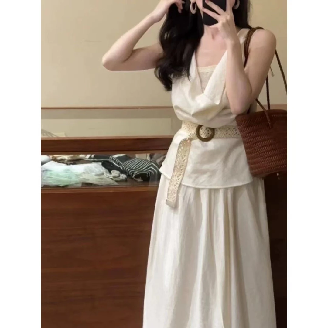 0318法式度假风挂脖白色连衣裙女夏季高级感气质收腰长裙