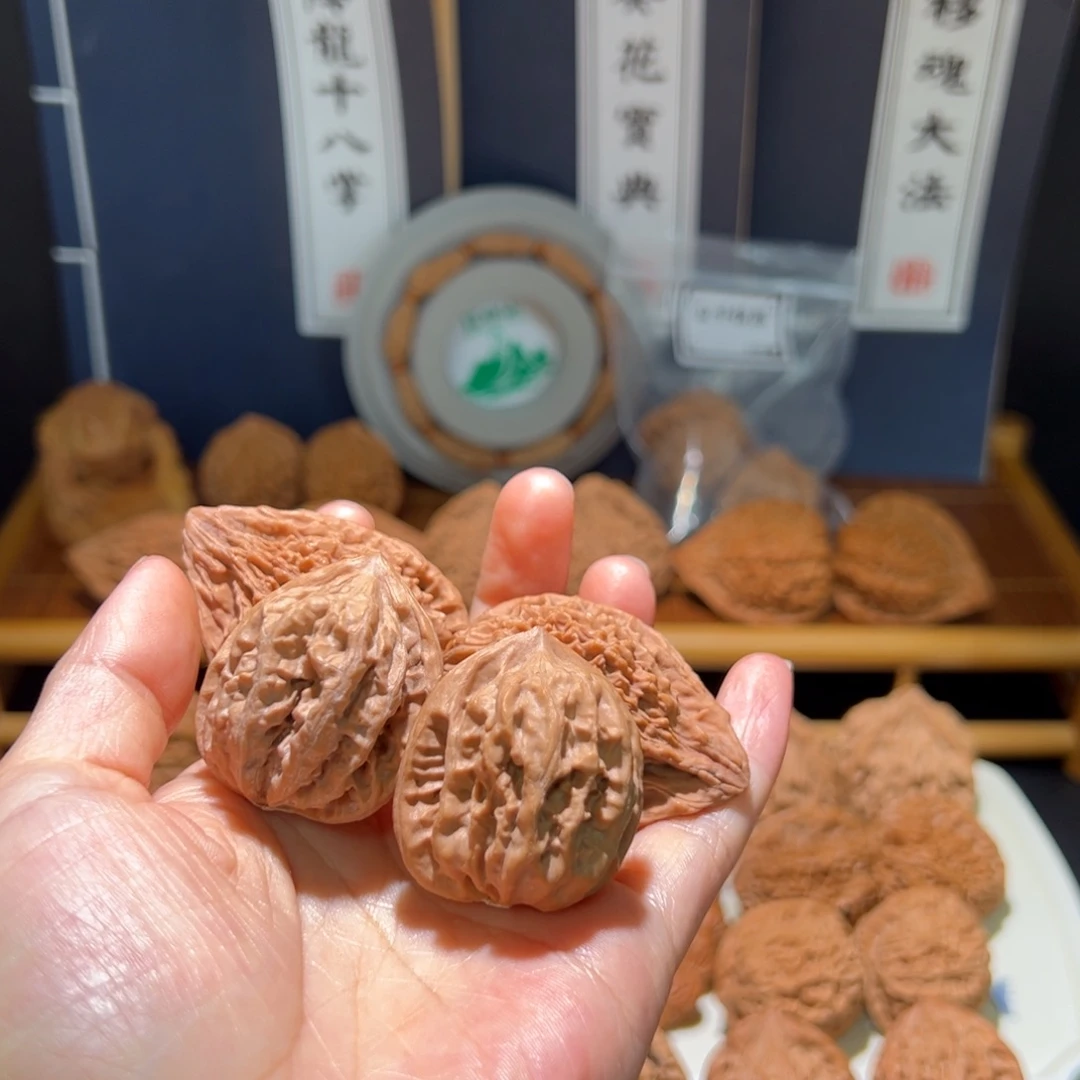 卡***e文玩核桃把件九纹龙陪嫁火凤