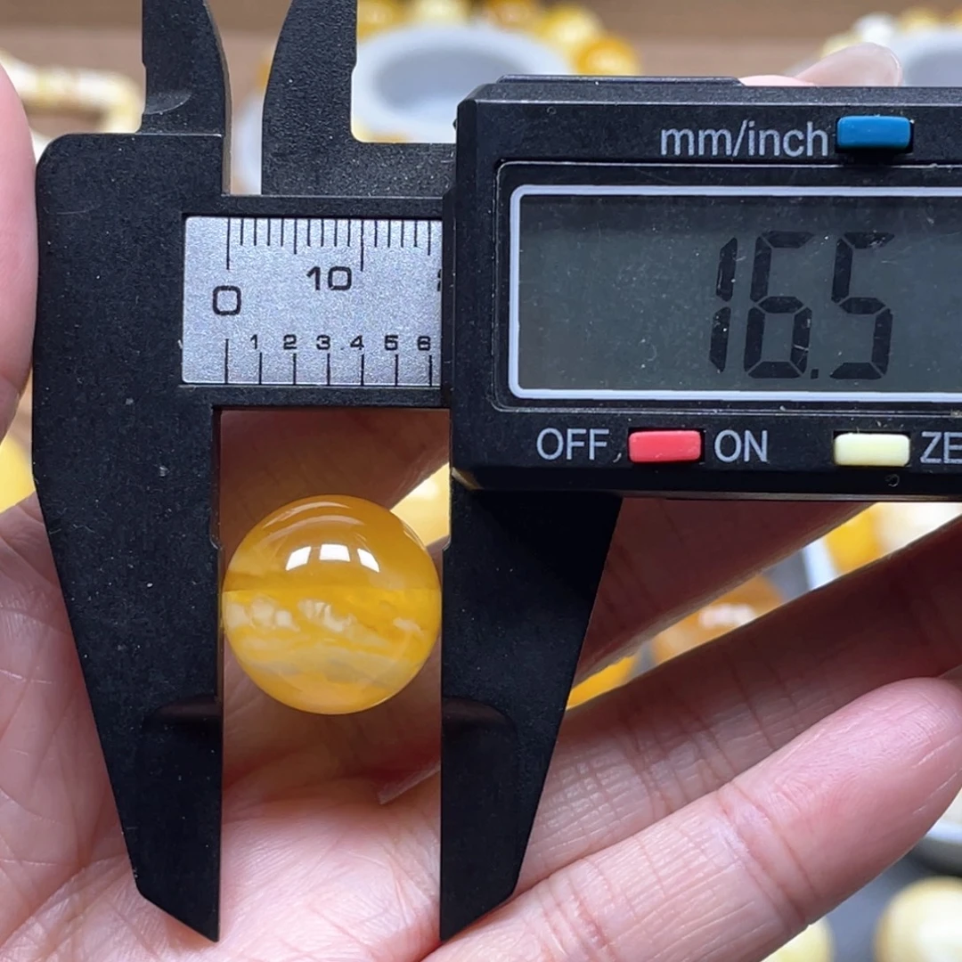 拳***呀未镶嵌琥珀裸石天然