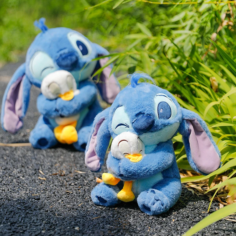 抱鸭史迪仔毛绒玩具可爱公仔玩偶抱枕女生礼物生日礼物毛绒玩偶