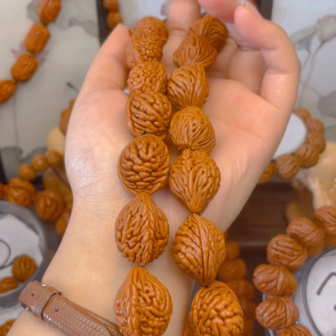 阳***阳秦岭龙纹桃核手串手链