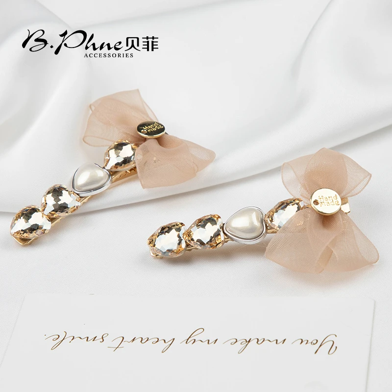 B.【贝菲】粉色丝带鸭嘴夹网红百搭