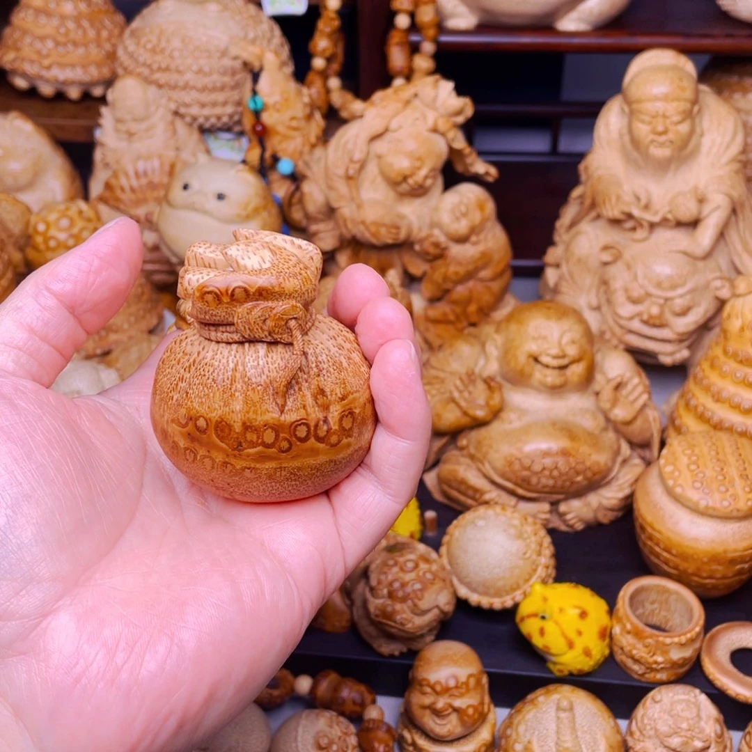 竹竹根雕钱袋把玩件