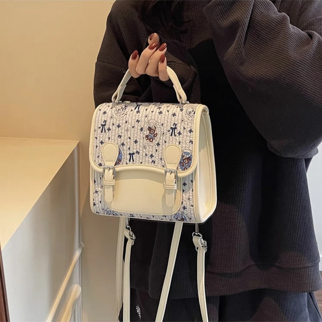 卡通小熊双肩包包女2025新款潮时尚可爱背包学院风单肩手提书包