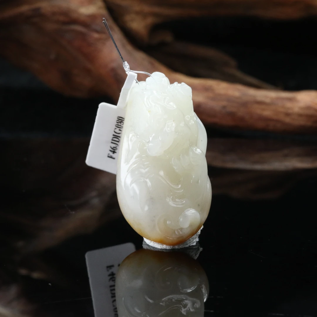 26和田玉洒金皮随性吊坠/000482北京中保拍卖