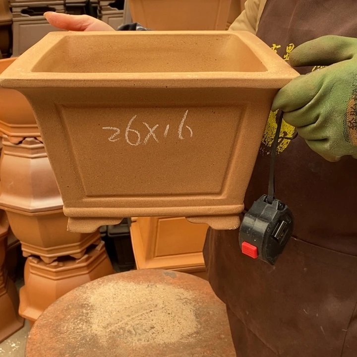 紫砂花盆只顾看你了