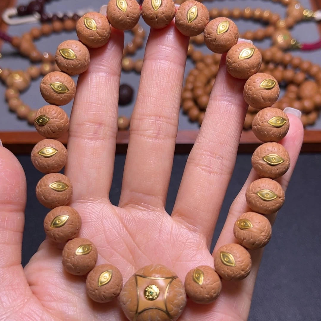 甄***途凤眼菩提吊坠12mm2025精品实心慈悲眼手串