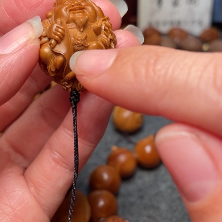 橄榄核吊坠小****李橄榄核