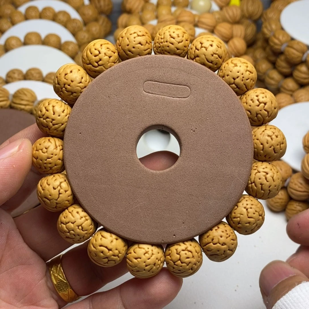 桃核手串疯*肌肉桃核手串