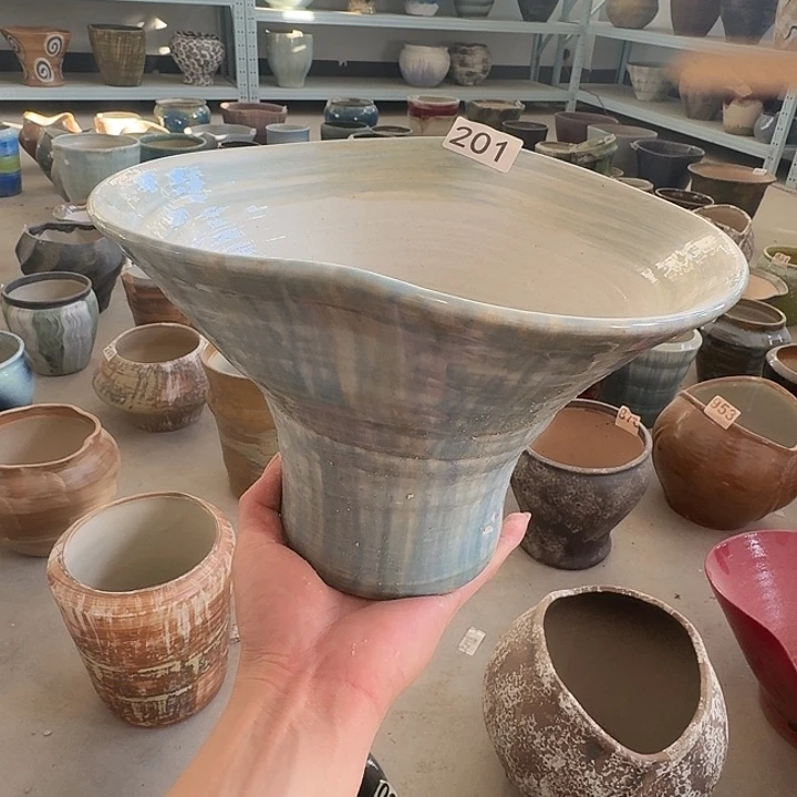 口25高19微瑕带孔一个