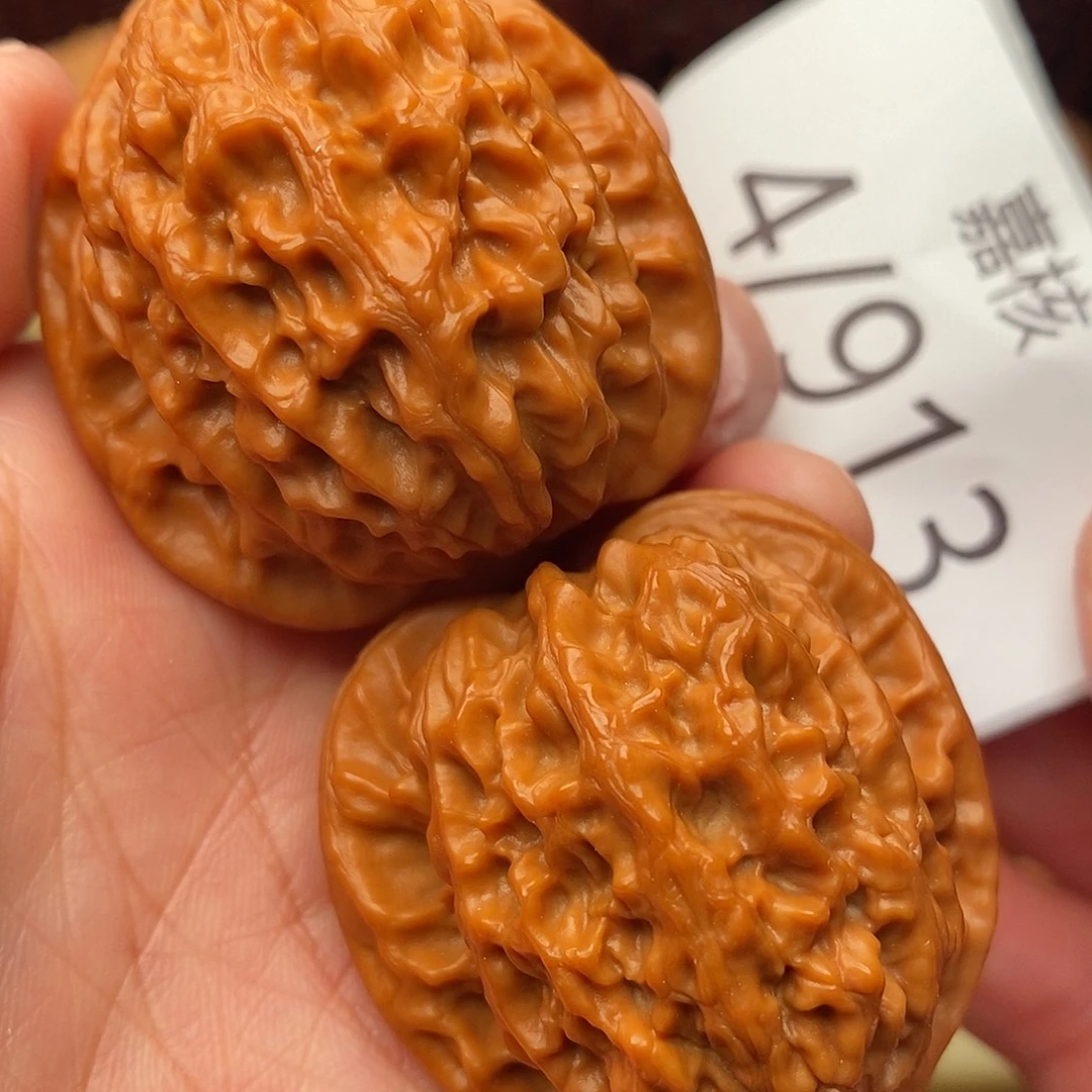 文玩核桃把件40金牛