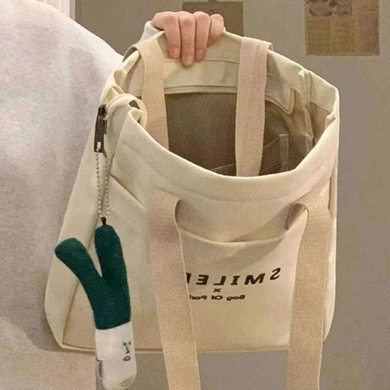 大容量托特帆布包上班外出通勤百搭文艺学生装书单肩布袋包手提