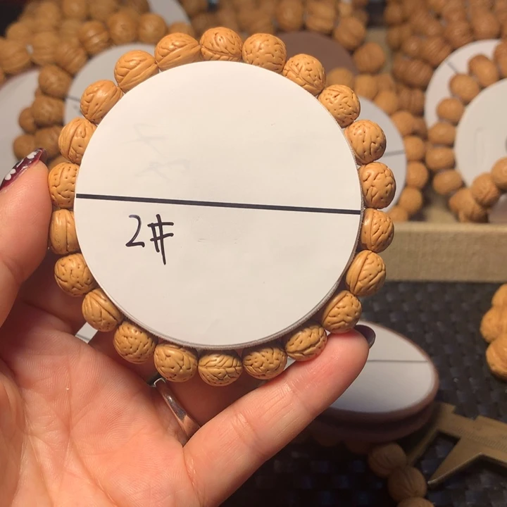 桃核手串发****片2号链接。。。。。