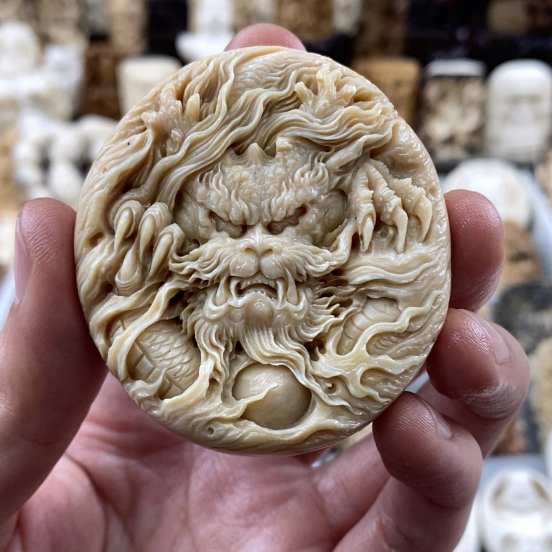 江***司猛犸象牙吊坠龙饼